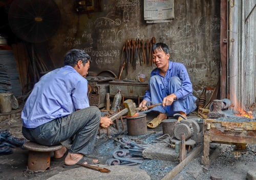 Vietnam Saigon Two Blacksmith at Work